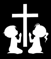 Picture of two kids kneeling at a cross